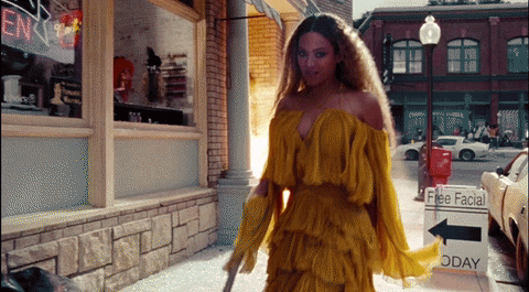 A .gif depicting a moment from Beyonce video where she is walking away from an explosion, swinging a bat, with an angry expression